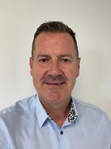 A profile picture of Andy Crawford of Business Moves Group