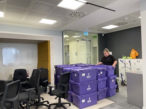 BMG crates stacked up in the West Midlands Trains office